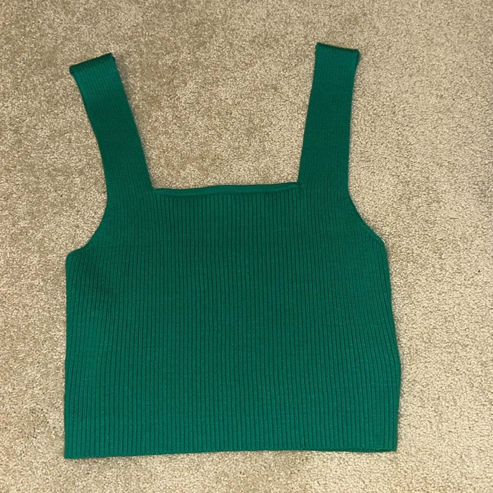 Green solid ribbed knit top. Size S.
